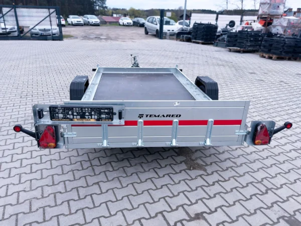Przyczepa samochodowa do przewozu quadów, motocykli z tylną burtą najazdową MULTITRANSPORTER 3016 750 KG
