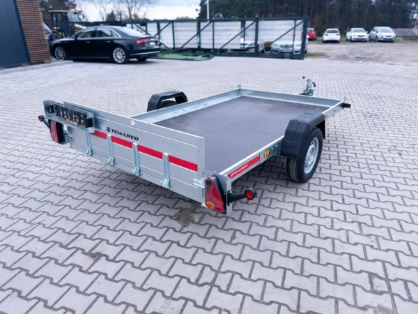 Przyczepa samochodowa do przewozu quadów, motocykli z tylną burtą najazdową MULTITRANSPORTER 3016 750 KG